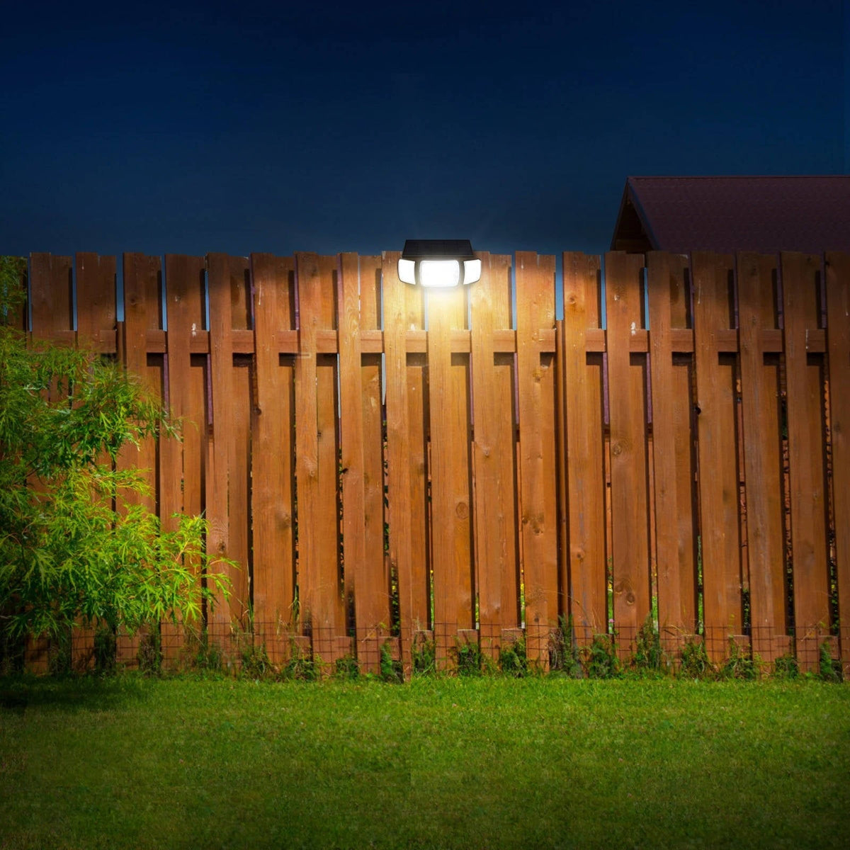 Belro solar powered flood light with motion sensor illuminating a garden outdoor space, ideal for home security and energy efficiency.