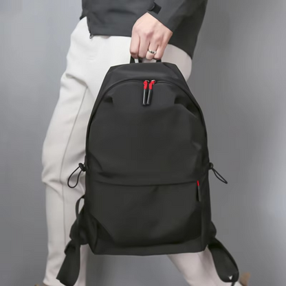 Belro minimalist black backpack designed for laptops, featuring sleek modern style and durable material for everyday carry.