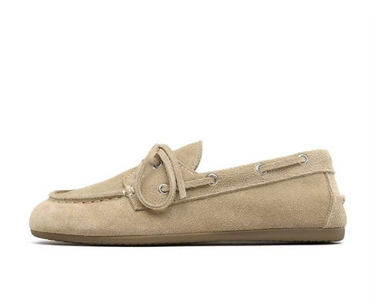 Women genuine leather moccasins by Belro, showcasing soft leather upper and classic slip-on footwear style.