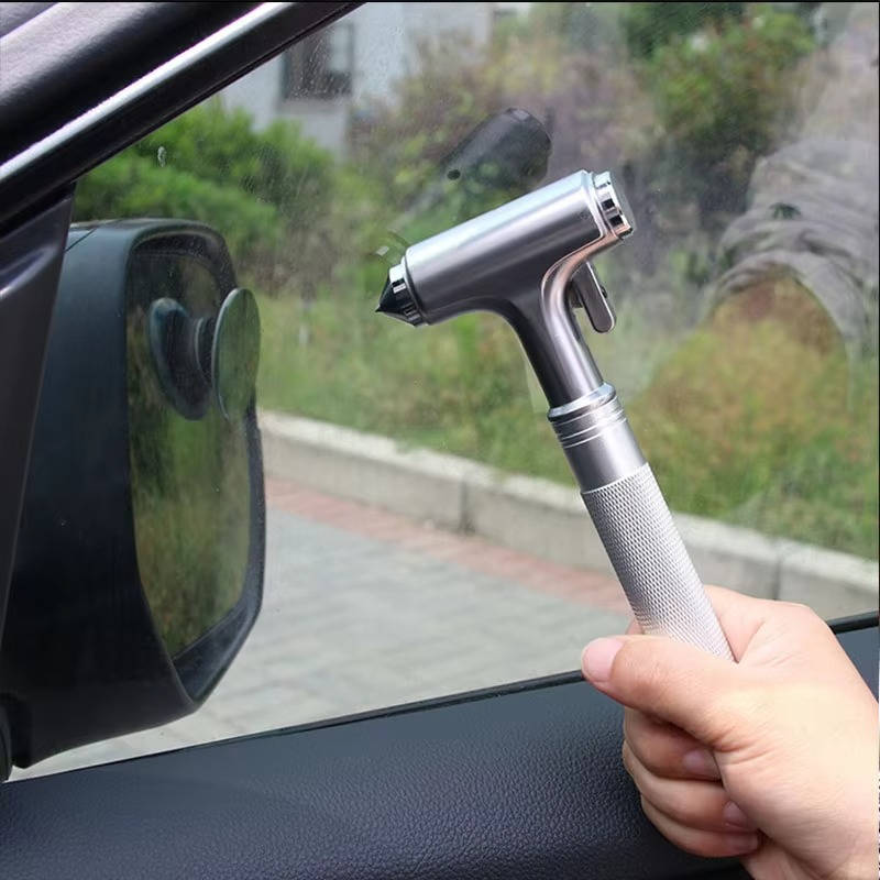 Belro automotive car safety hammer with orange handle and metal tip, designed for breaking glass in emergencies.