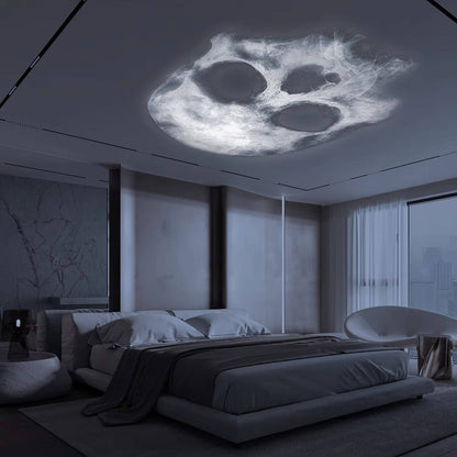 Belro Halloween light projector displaying spooky ghost and pumpkin images on a wall for festive decoration.