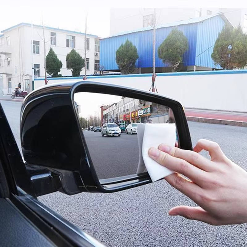 Belro windshield water repellent applied to car windshield, showcasing water bead runoff for improved visibility and protection.