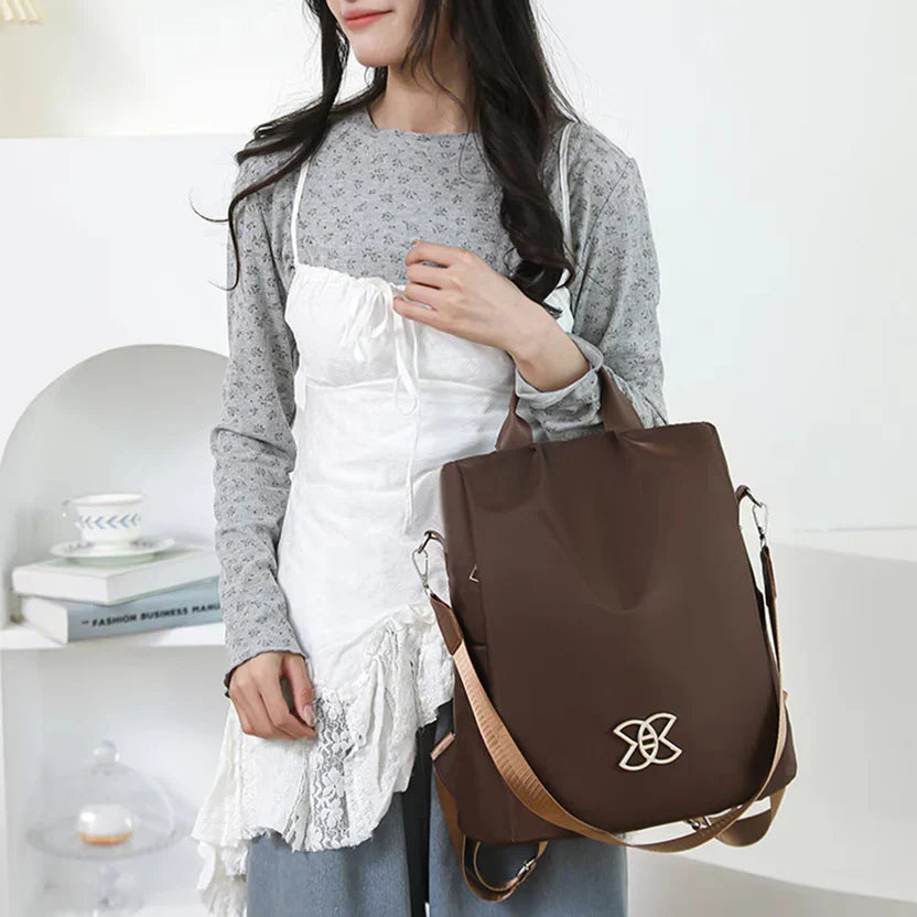 Mivoza anti-theft backpack with water-resistant fabric, hidden pockets, and three carry options, designed for secure and versatile use.