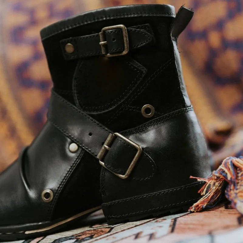 Men's vintage-style buckled ankle boots by Belro, showcasing dark leather with buckle accents and sturdy sole detail.