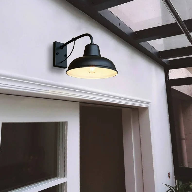 Vintage antique barn light fixture by Belro, featuring rustic metal and warm glow, perfect for vintage-style interior decor.