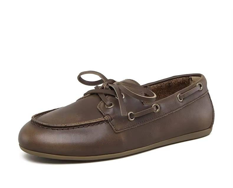 Women’s genuine leather moccasins by Belro, stylish and comfortable footwear with detailed stitching and soft leather finish.