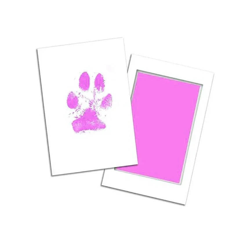 Belro Dog Paw Print Kit for pet grooming, showing materials and stamps for creating paw print keepsakes.