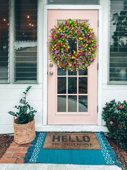 Colorful artificial wildflower spring wreath from Belro, decorative home and garden decor with vibrant, spring-inspired floral accents.