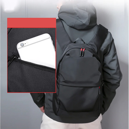 Belro minimalist black backpack designed for electronics and laptops, featuring sleek, simple style with multiple compartments.