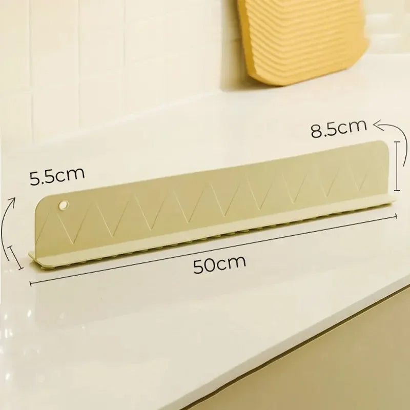Belro silicone sink splash guard with suction cups, designed to protect countertops from water splashes in the kitchen.