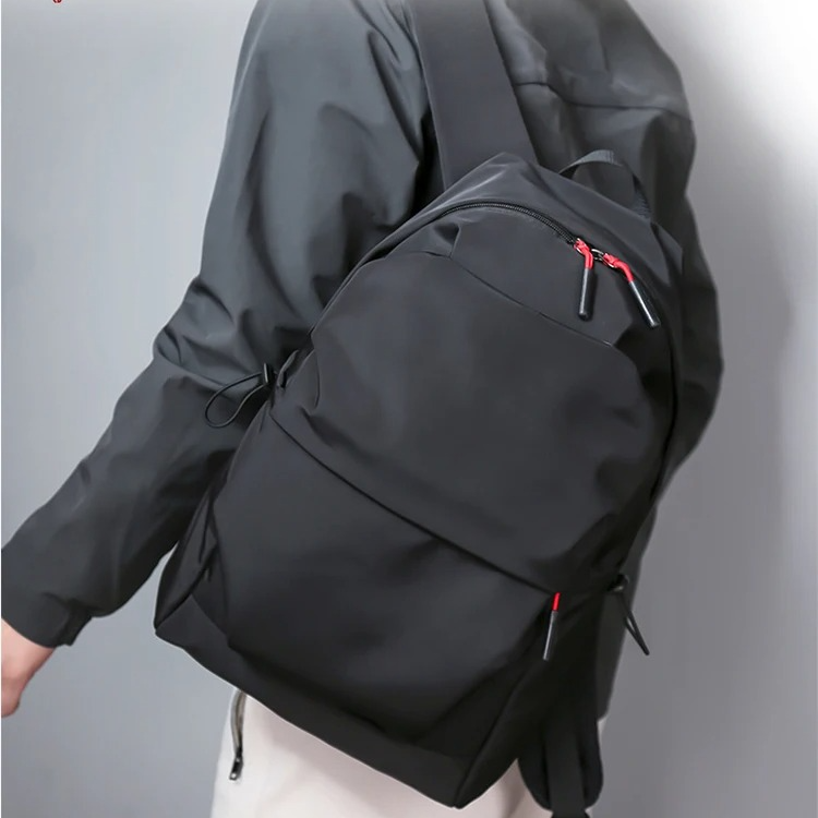 Black minimalist Belro backpack designed for laptops, with sleek modern style and durable material suitable for electronics storage.