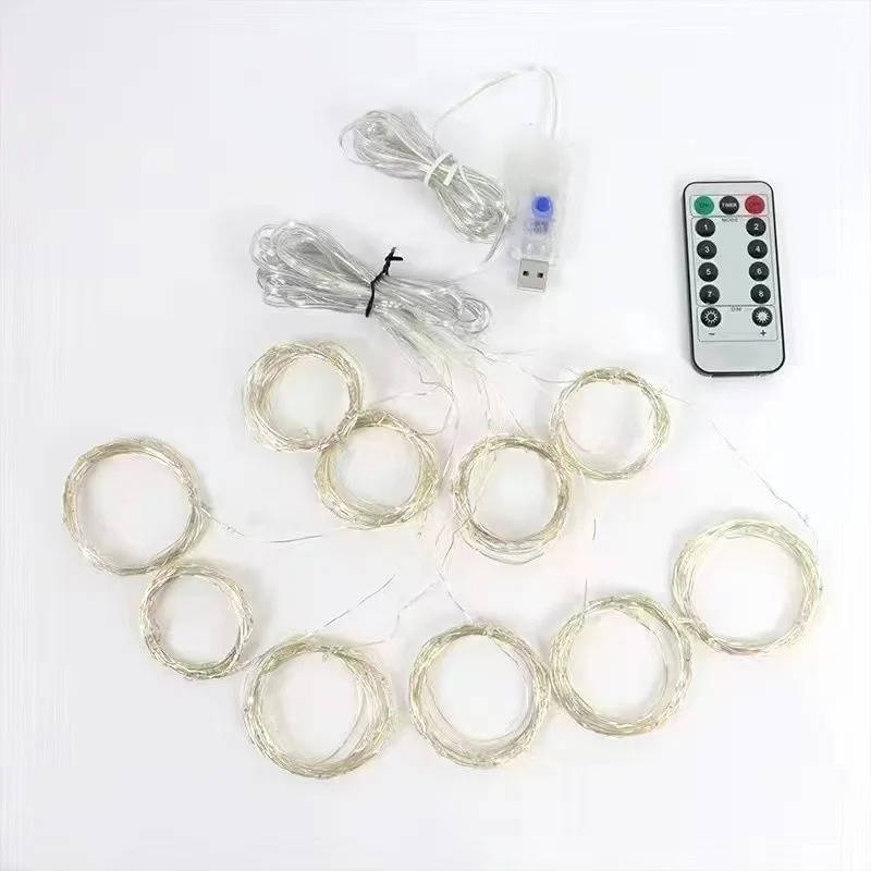Belro Curtain LED Lights hanging outdoors, decorative string lights for home and garden ambiance, warm white glow visible in the image
