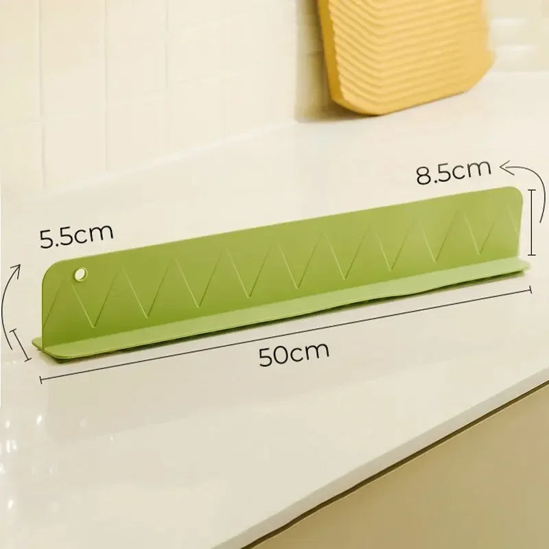 Belro silicone sink splash guard with suction cups, flexible kitchen appliance accessory, designed to prevent water splashes.