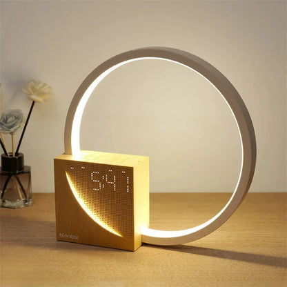 Belro Touch Bedside Table Lamp with natural sounds and alarm clock, showcasing its sleek design and control panel in a bedroom setting.