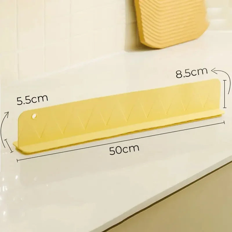 Belro silicone sink splash guard with suction cups, designed to protect countertops from water splashes in the kitchen.