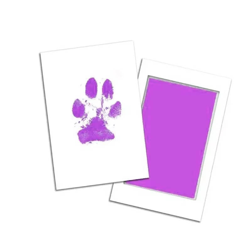 Belro Dog Paw Print Kit for pet grooming, showing paw print stamp and supplies used for creating custom dog paw prints.