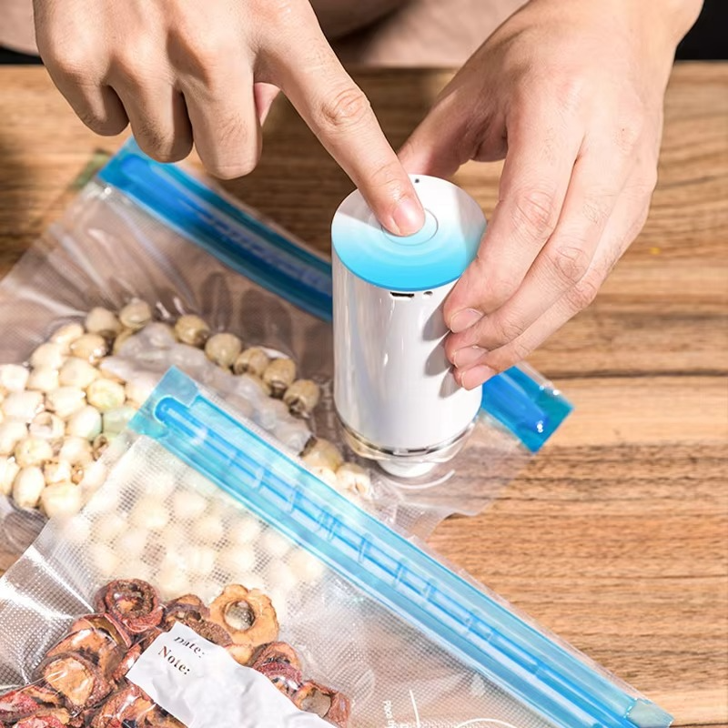 Belro compact food vacuum sealer with vacuum bags, designed for preserving food freshness and sealing items efficiently.