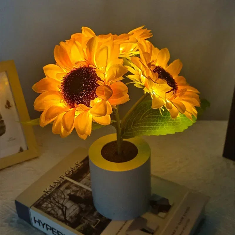 Belro rechargeable sunflower night light emitting warm glow, compact electronic LED night light for bedroom or bedside use.