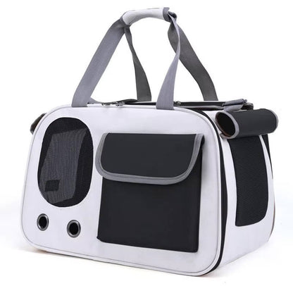 Belro automotive travel pet carrier for cats and small dogs, with mesh windows and secure zipper closures.