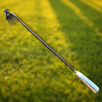 Belro Crescent Weeder Tool with long handle for garden weeding, outdoor garden tool in a natural garden setting