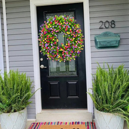 Colorful artificial wildflower spring wreath by Belro, decorated with vibrant faux flowers for home decor.