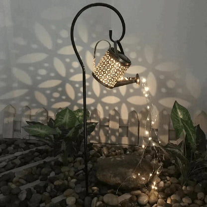 Mivoza solar garden lamp with watering can design, outdoor decorative lighting, features rain sound effect, illuminated at dusk