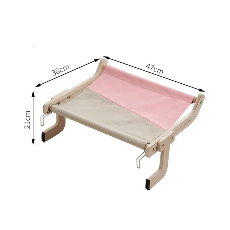 Belro wooden cat hammock bed hanging outdoors, crafted from natural wood, designed for cozy feline comfort in outdoor spaces.
