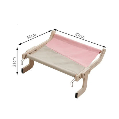 Belro wooden cat hammock bed hanging outdoors, crafted from natural wood, designed for cozy feline comfort in outdoor spaces.
