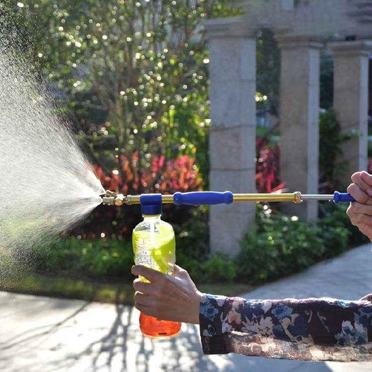 Belro high-pressure hand garden pump sprayer for watering and gardening, shown in use with a garden hose attachment.