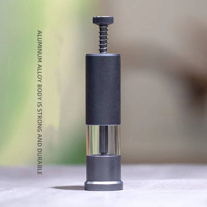 Belro Mini Fish Feeder in an aquarium, compact pet supply for automatic fish feeding, with a clear container and feeding mechanism.
