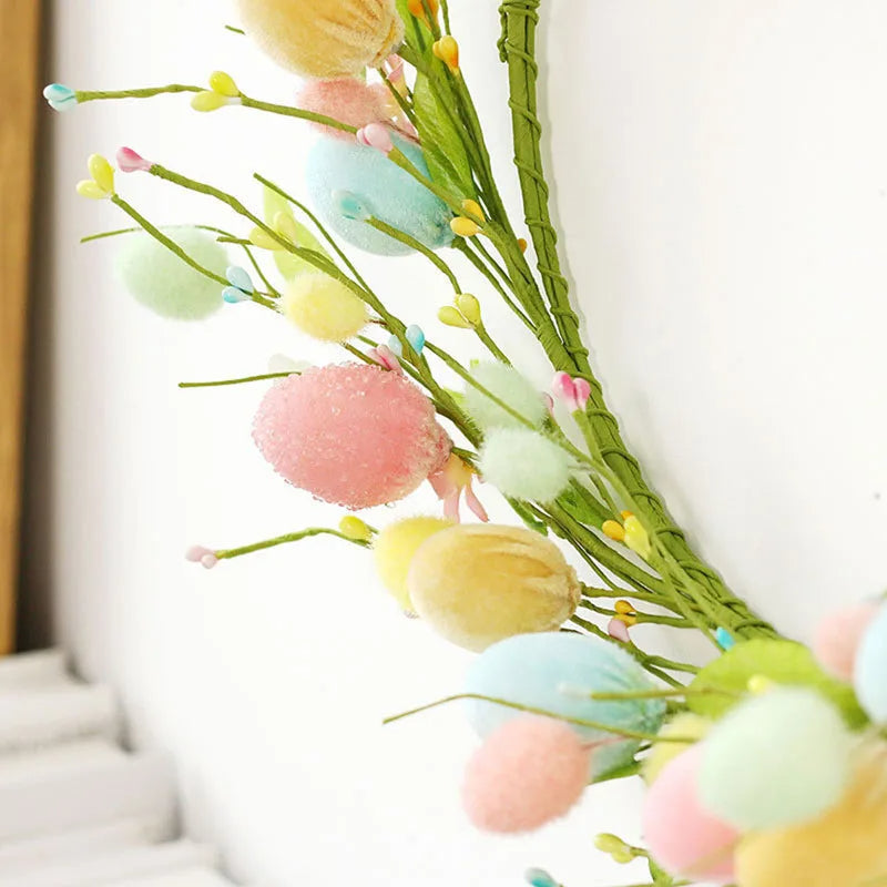 Colorful spring floral Easter egg wreath by Belro featuring vibrant decorated eggs and blooming flowers for holiday decor.