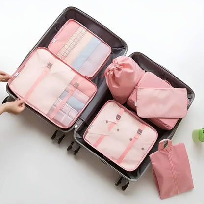 Set of seven Belro packing cubes for travel, compact fabric bags for organizing clothes in luggage and suitcases.