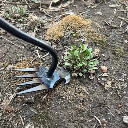 Belro men's weed tool remover in clothing, showing a close-up of the durable tool designed for easy weed removal.