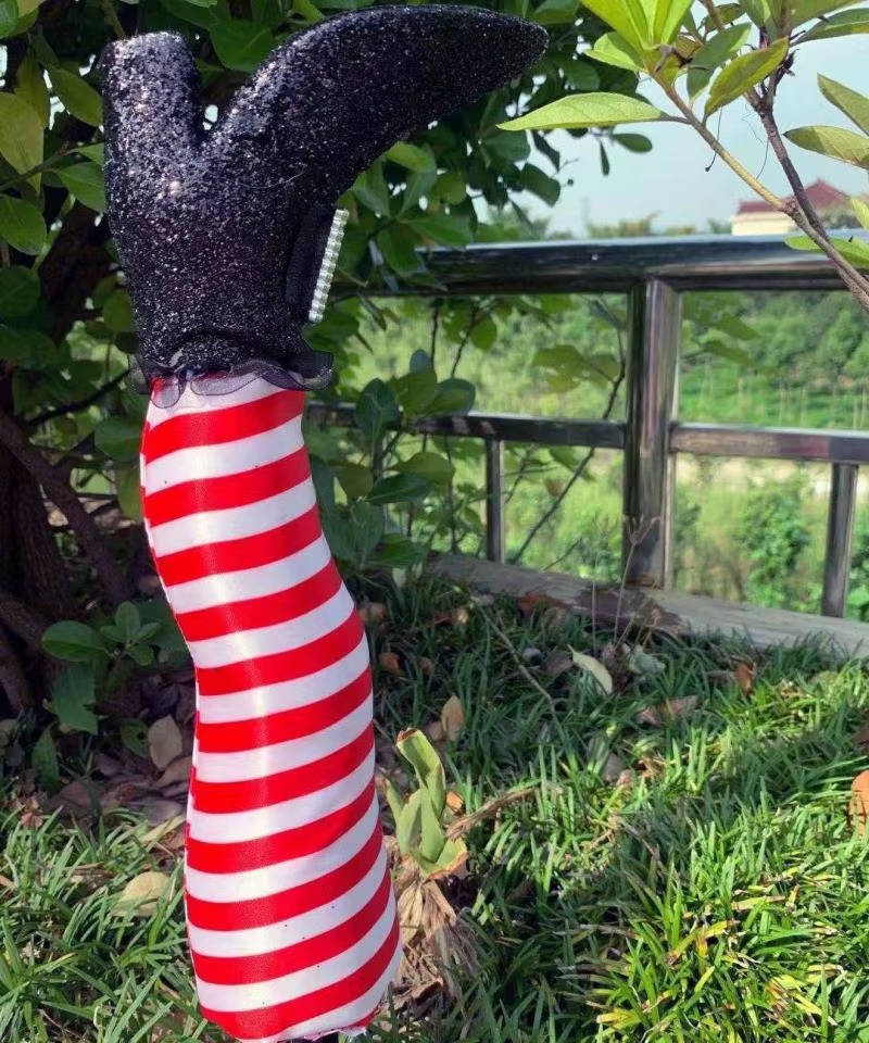 Belro Witch Legs Halloween decoration for home and garden holiday decor, showing spooky witch legs with striped stockings.