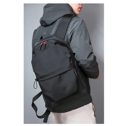 Black minimalist Belro backpack designed for laptops, with sleek, simple exterior and adjustable straps for electronics and computer storage.