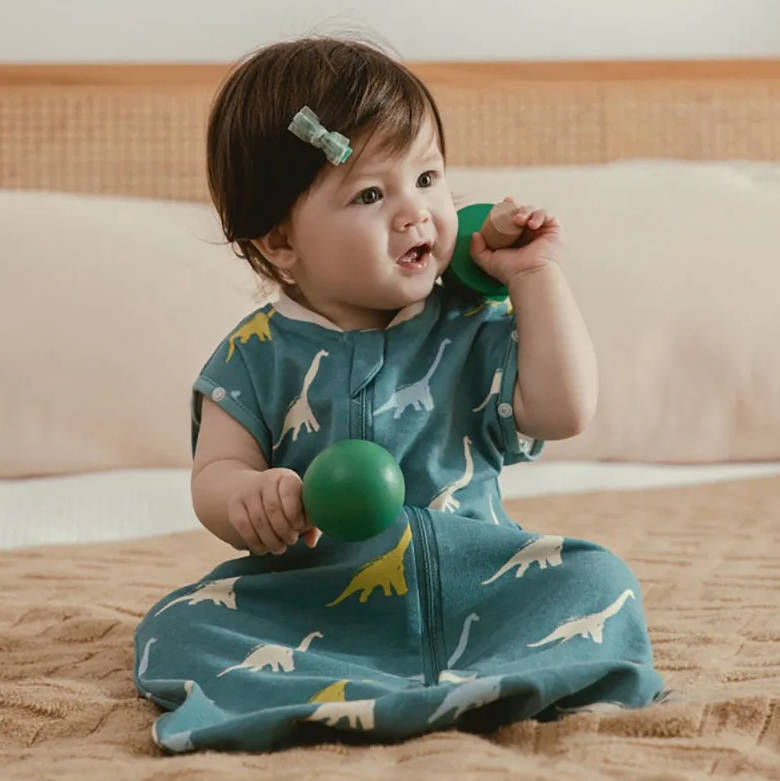 Soft Belro baby sleeping bag in cozy sleepwear, designed for comfortable sleep and gentle warmth for infants.