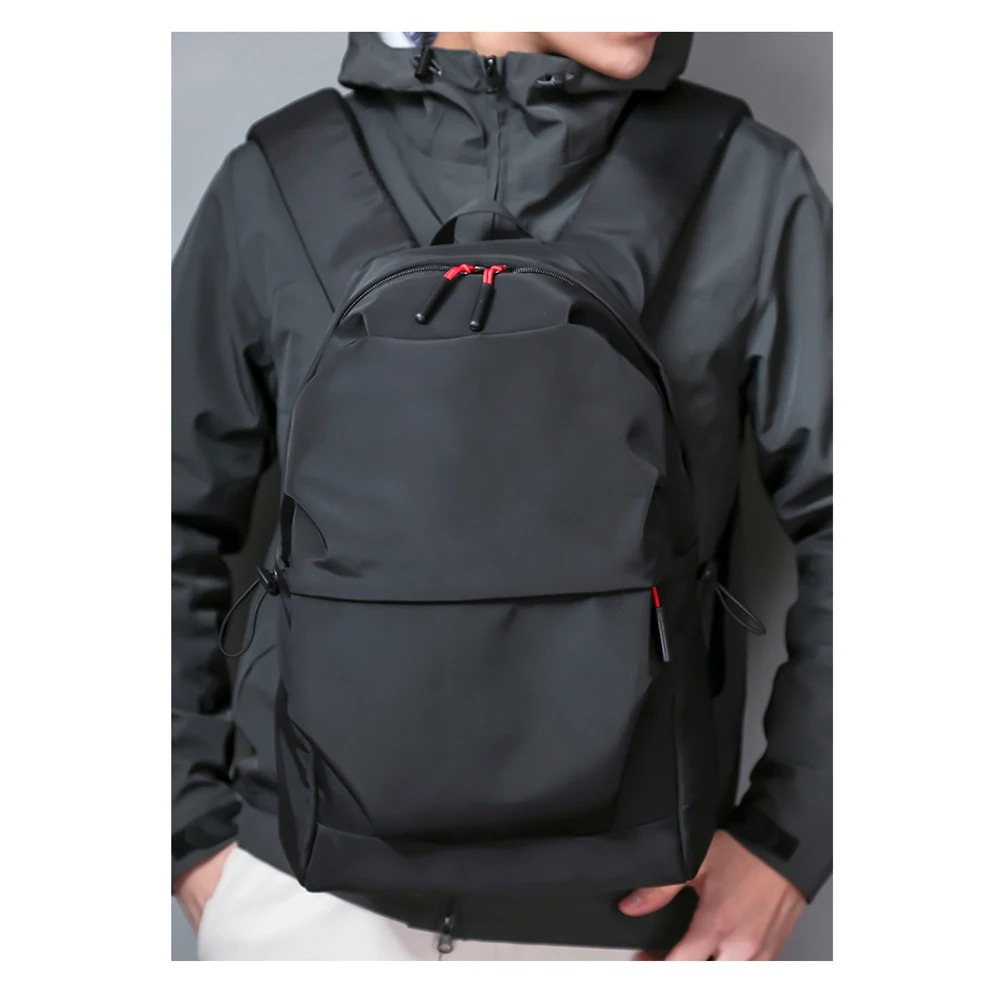 Belro minimalist black backpack with sleek design, suitable for laptops and electronics, featuring clean lines and durable material.