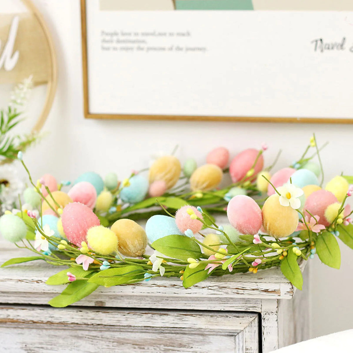 Colorful spring floral Easter egg wreath by Belro, featuring vibrant flowers and decorated Easter eggs for holiday home decor.