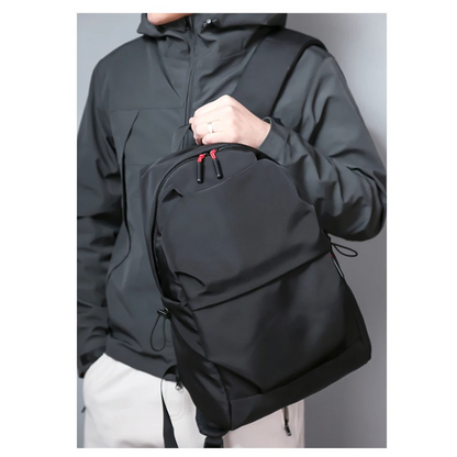 Belro minimalist black backpack designed for laptops, featuring sleek, modern style with multiple compartments for electronics.