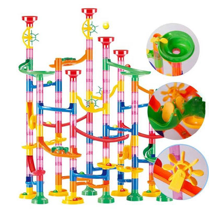 Colorful marble run toy by Belro featuring interconnected plastic tracks and marbles on a play surface.