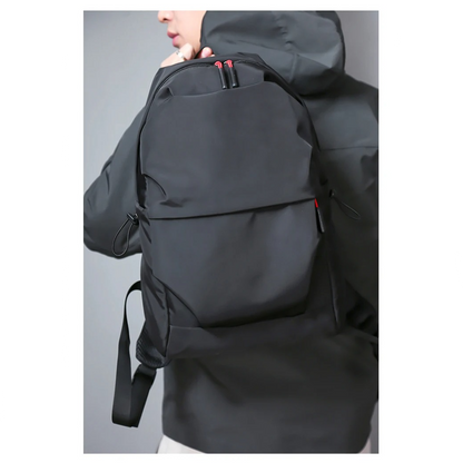 Black Belro minimalist backpack designed for laptops, with sleek, simple exterior and secure compartments for electronics.