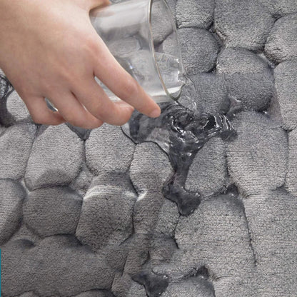 Belro Cobblestone Embossed Bathroom Mat with textured, stone-like pattern in neutral colors for home bathroom decor.