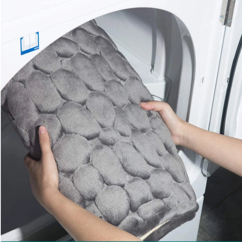 Belro Cobblestone embossed bathroom mat with textured, stone-like pattern, ideal for adding style and comfort to bathroom decor.