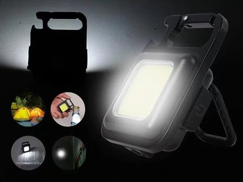 Belro Mini LED flashlight keychain with 1800 lumens, compact portable light attached to a keyring, black color.