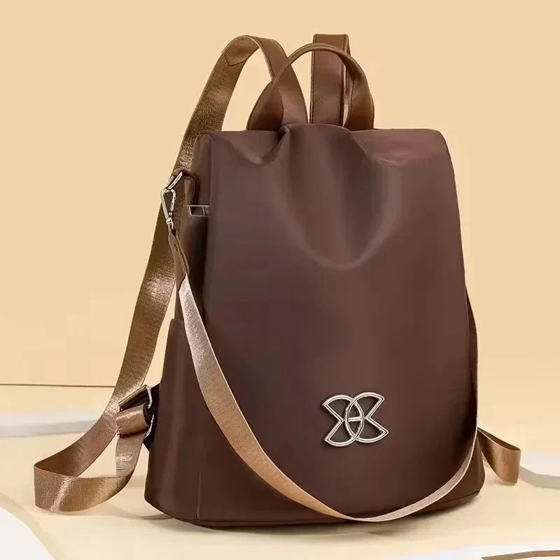 Mivoza anti-theft backpack with water-resistant fabric, multiple carry options, and hidden pockets for secure storage.