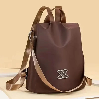 Mivoza anti-theft backpack with water-resistant fabric, multiple carry options, and hidden pockets for secure storage.