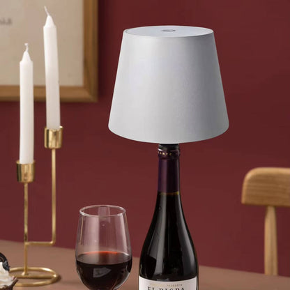 Wireless Bottle Lamp by Belro, portable LED night light in a clear glass bottle with a soft glow, ideal for ambient lighting.