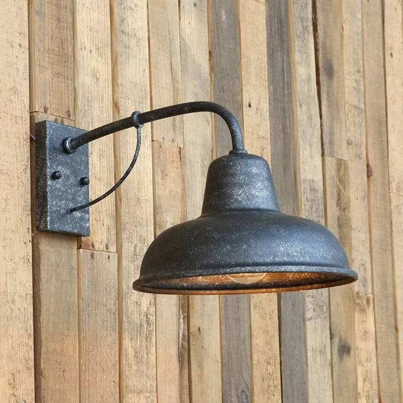 Antique vintage barn light with metal finish, designed for vintage decor, shown as a standalone lighting fixture.