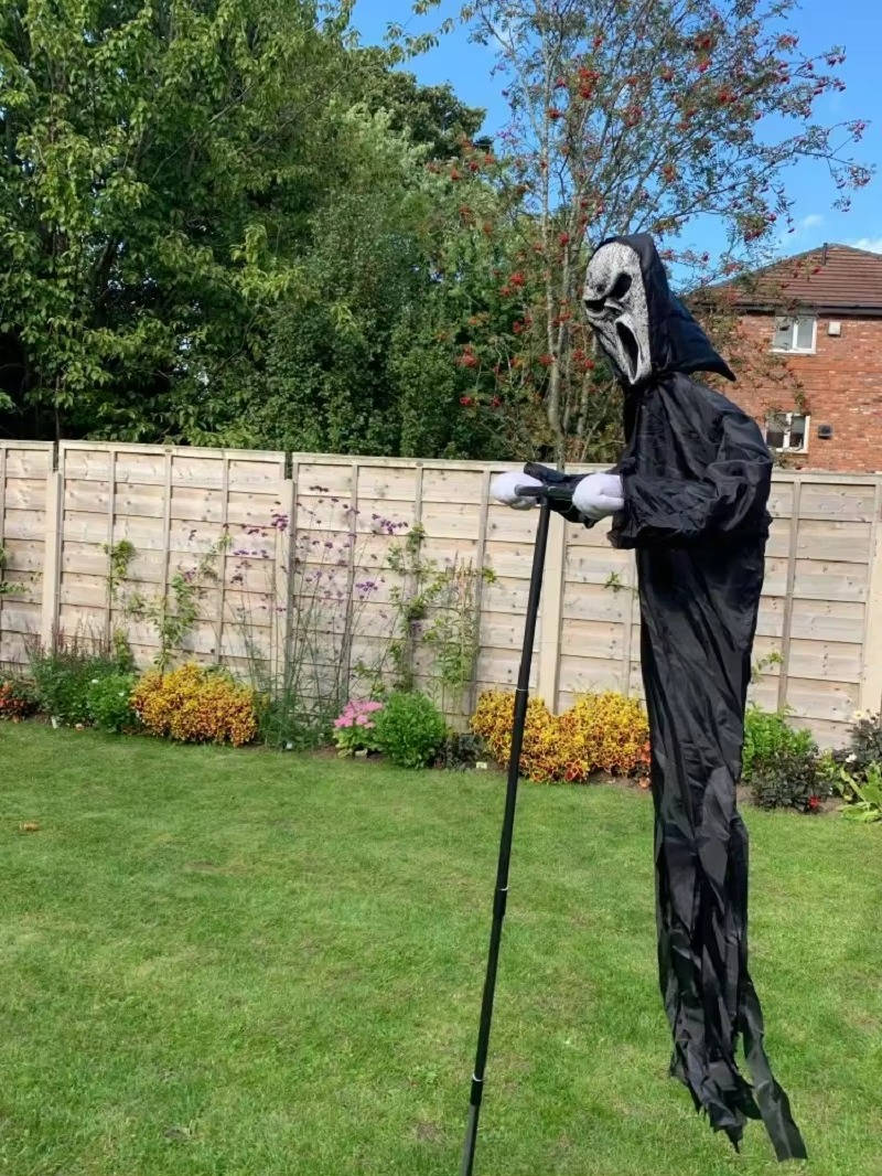 Belro outdoor Halloween decoration featuring a spooky Halloween scene with eerie figures for home and garden holiday decor.