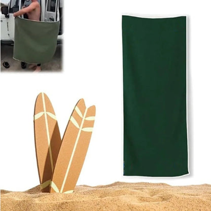 Belro magnetic quick-dry beach towel spread out on a sandy beach, showcasing its lightweight, absorbent fabric and magnetic closure.